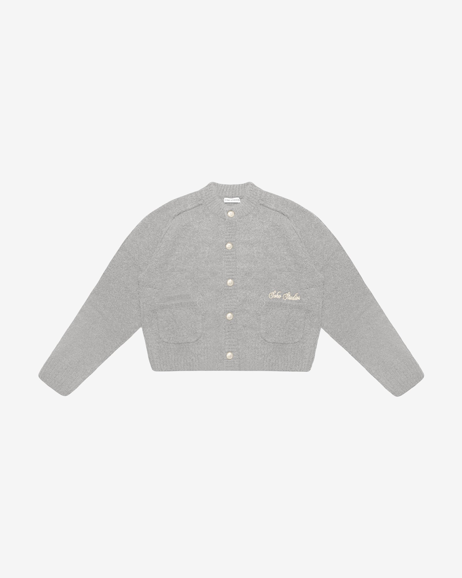 Gray cardigan with gold buttons on a white background