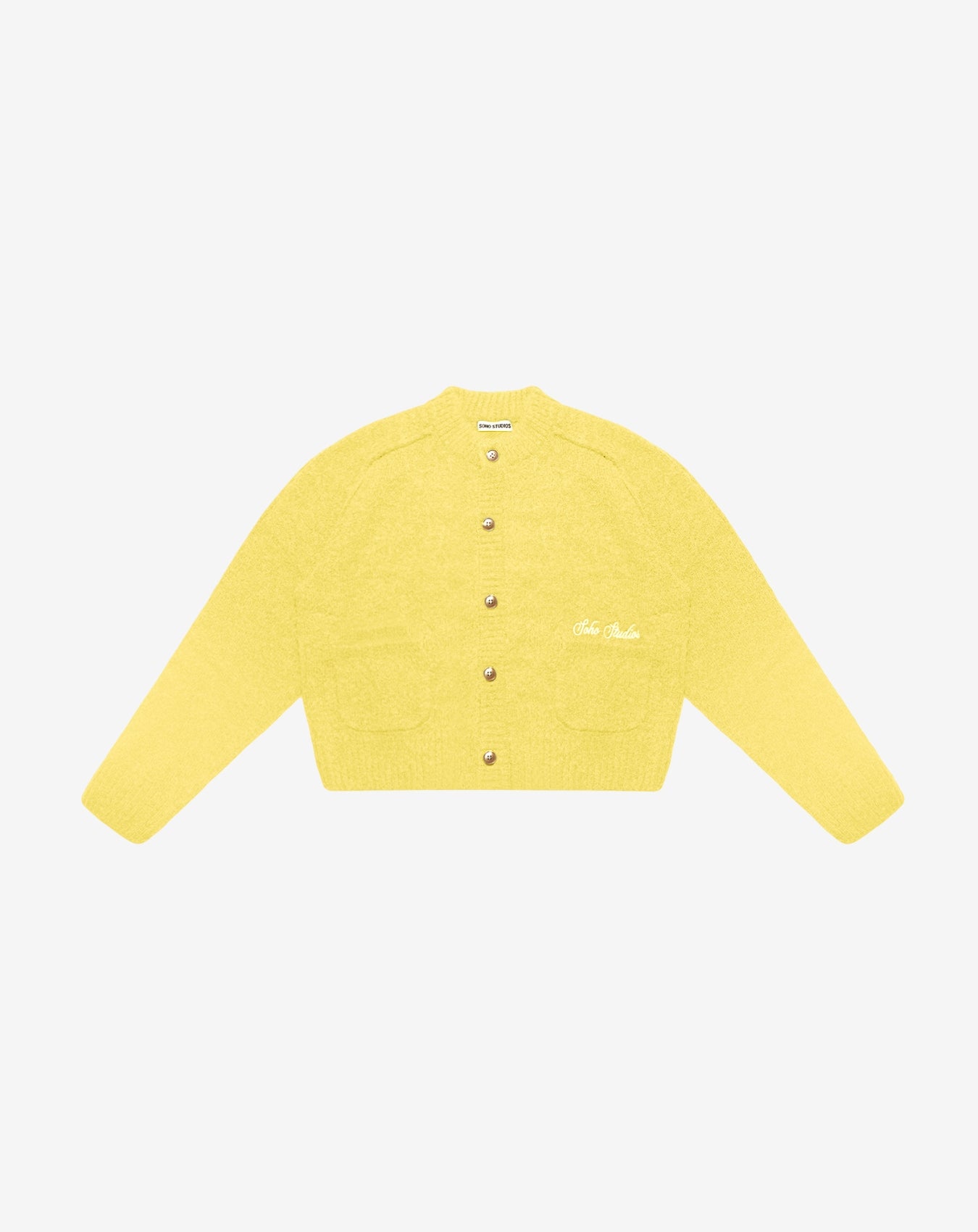 Yellow textured cardigan on a white background