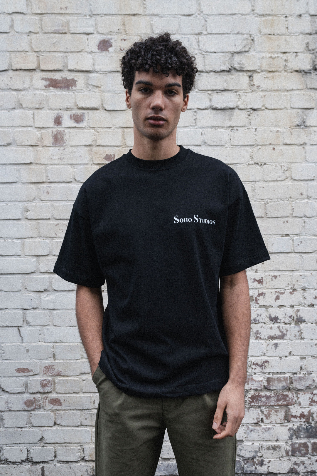 Black Soho Studios graphic t-shirt with oversized design