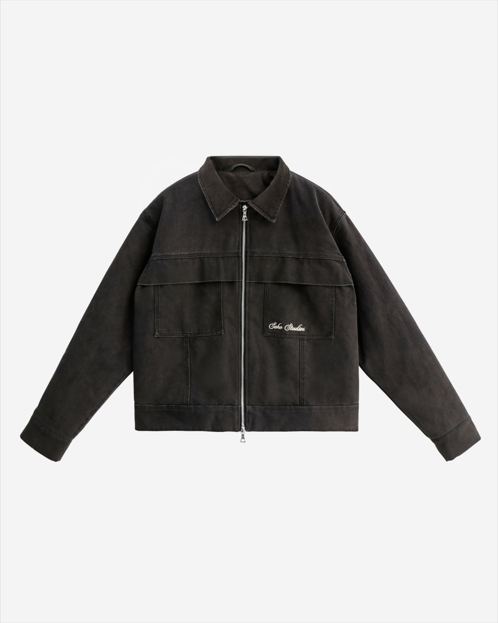A vintage black trucker jacket with a collar, long sleeves, and a front zipper.