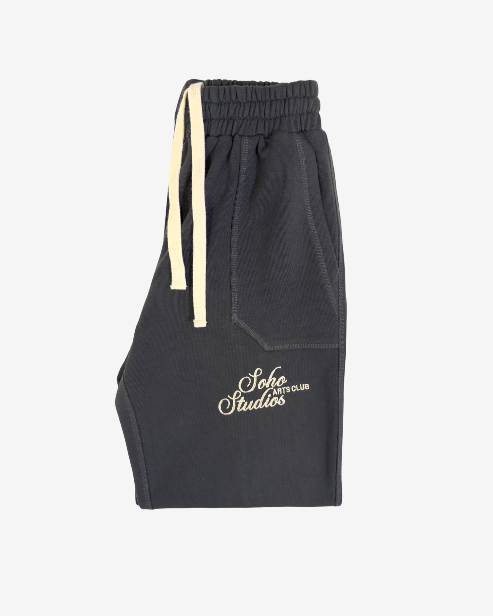A pair of gray ARTS CLUB SWEATPANTS with a drawstring waistband, front-facing pockets, and chainstitch embroidery logo.