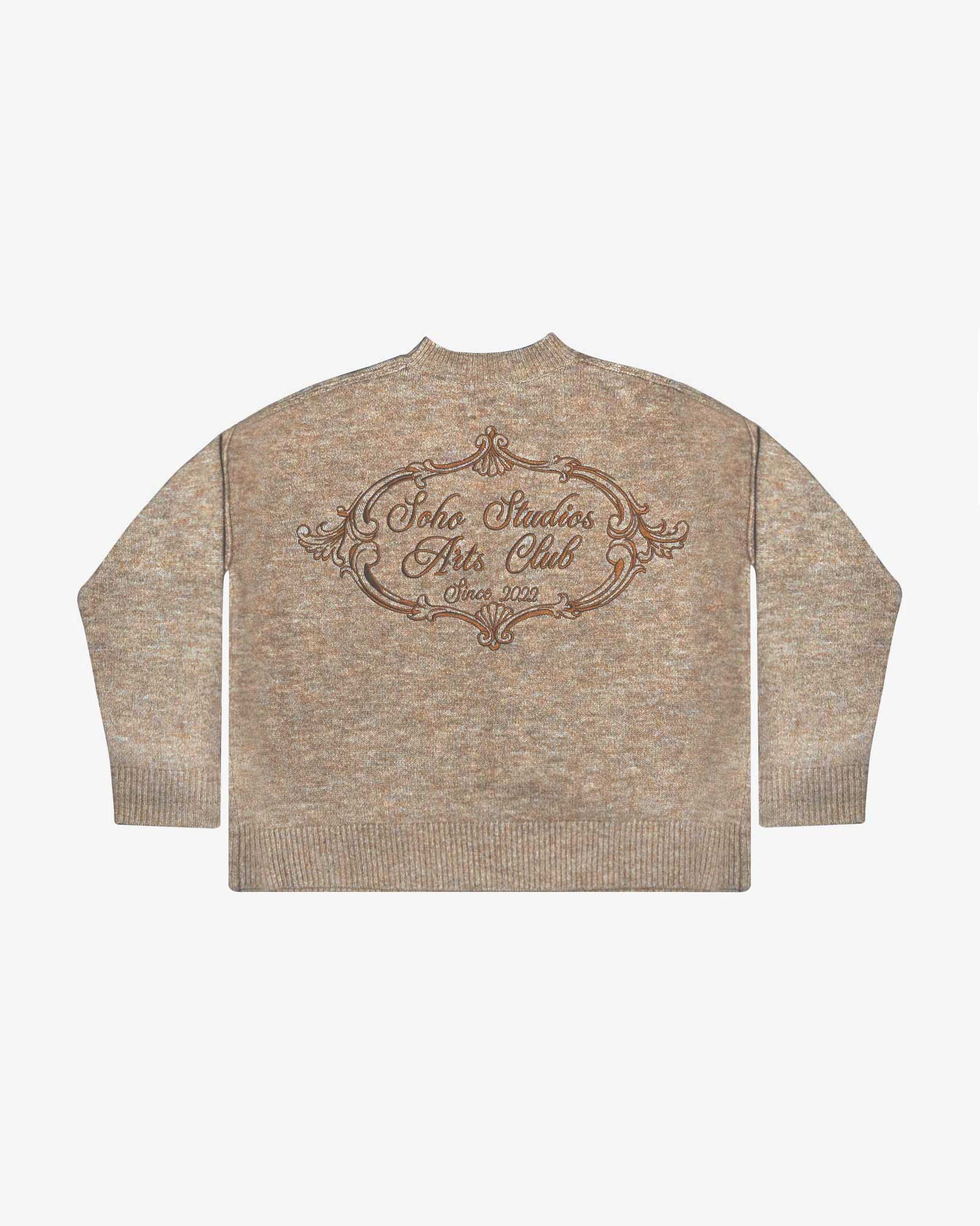 Beige Soho Studios knitted sweater with embroidered Arts Club back graphic