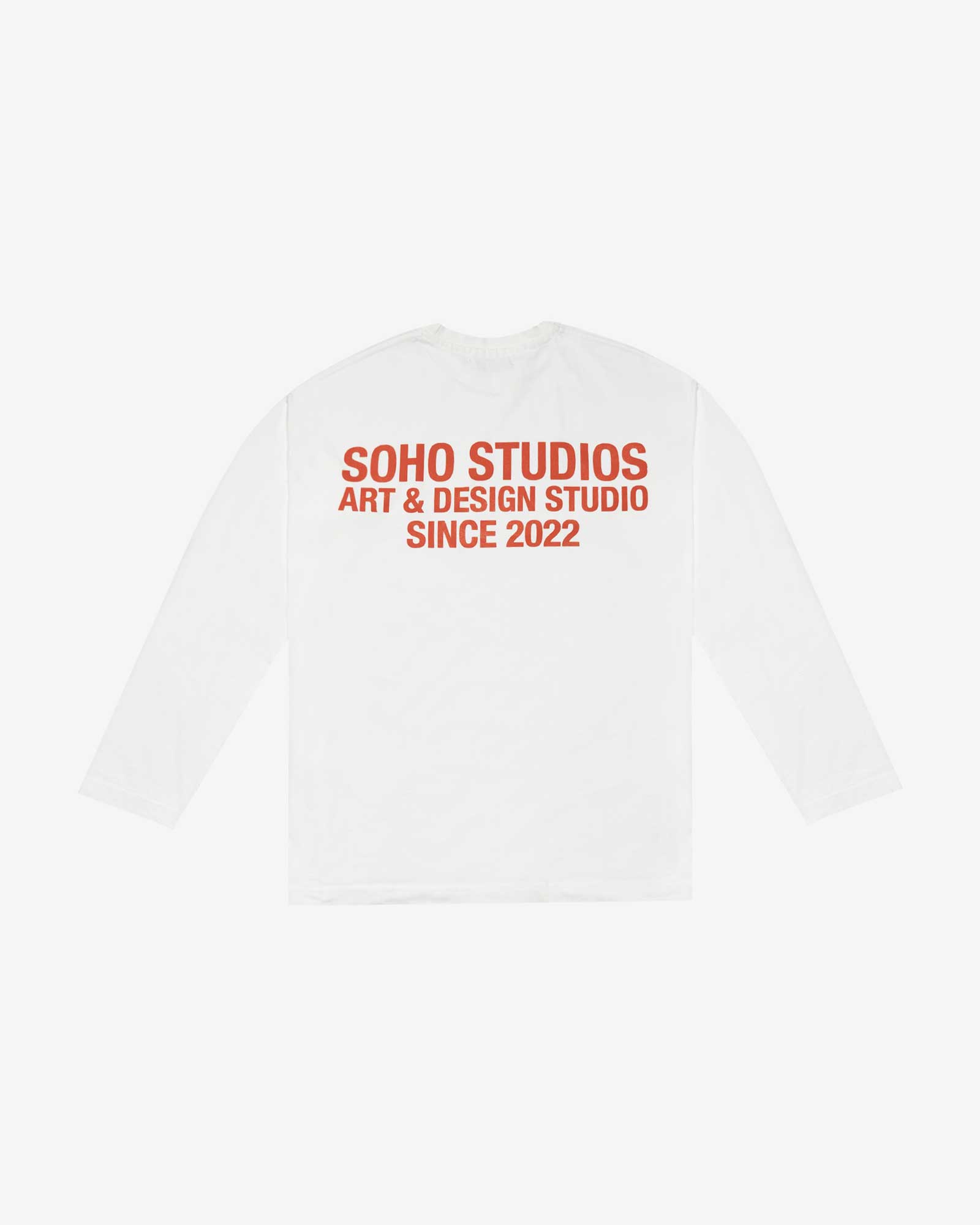 White long sleeve Soho Studios graphic shirt with orange back print