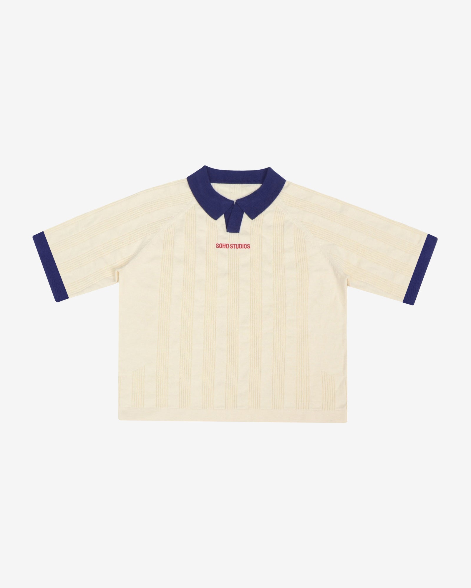 Beige polo shirt with navy accents on a white background